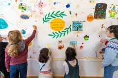 Young assembly members using drawing to share ideas on biodiversity loss